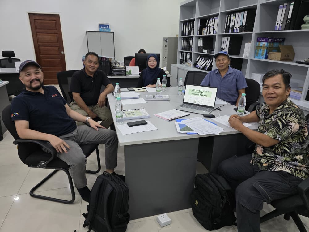 Environmental consultants attending an office project meeting